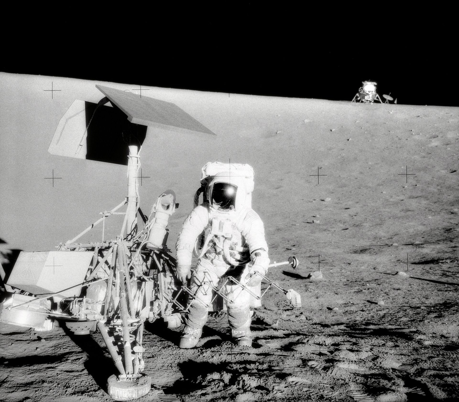 Astronaut Conrad with Surveyor III on Moon surface
