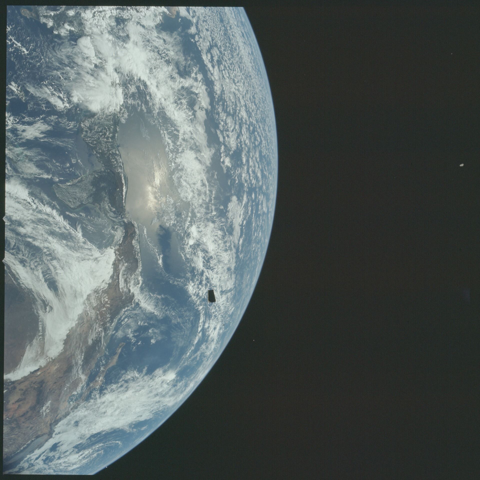 Earth and Apollo 12 in Orbit