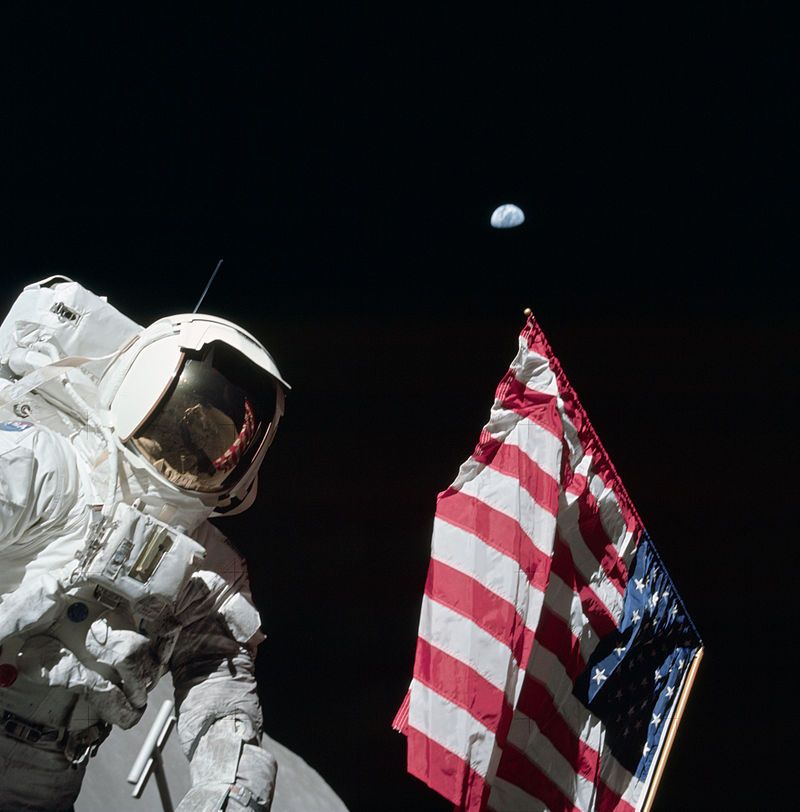 Astronaut Schmitt with American flag during Apollo 17