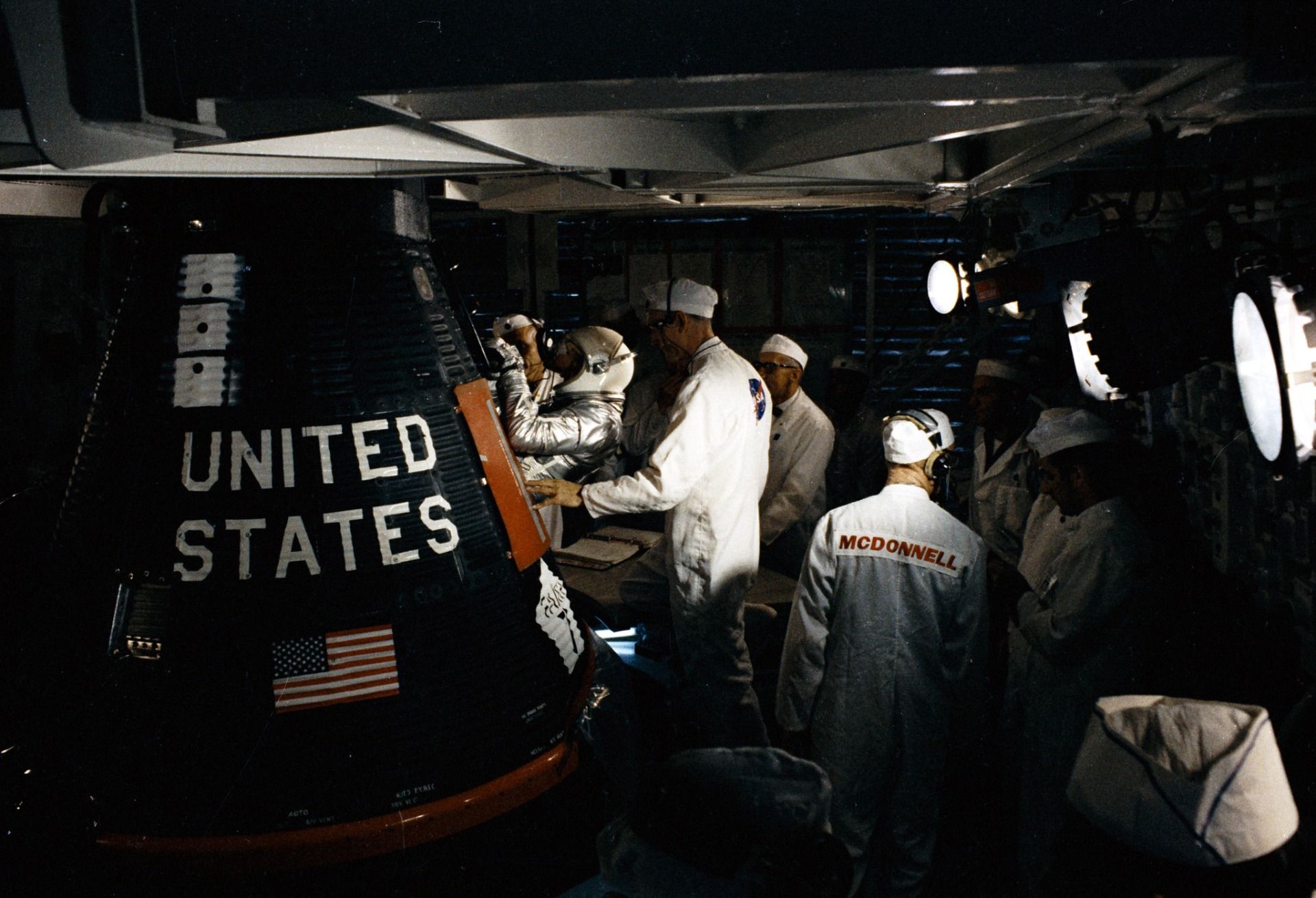 Cooper entering Faith 7 spacecraft before launch