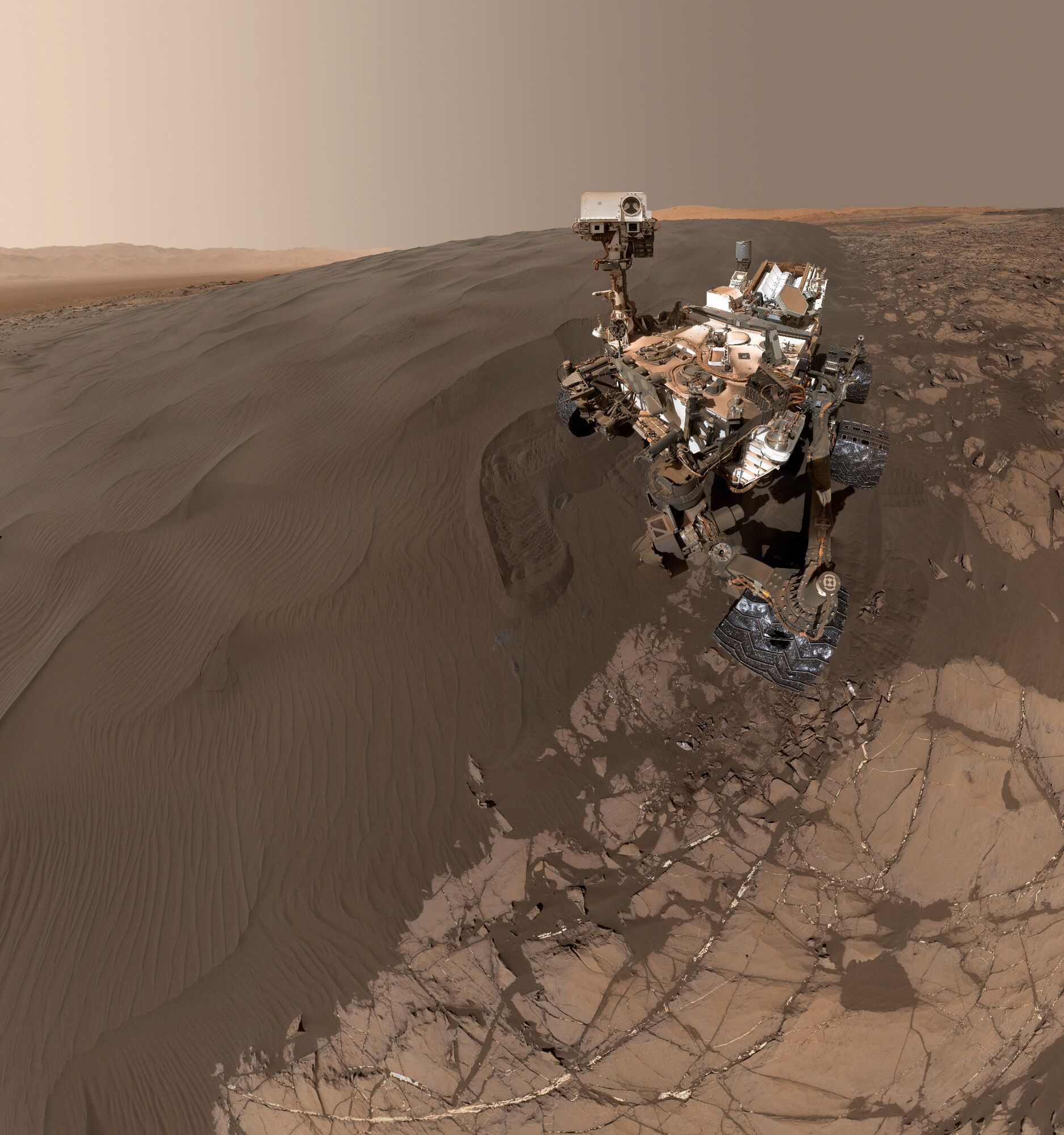 Curiosity rover taking picture of itself on Mars sand dunes
